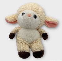 Front view of cream plush lamb doll