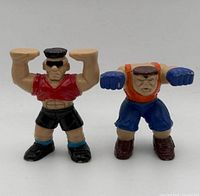 Front view of both stacking action figures