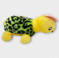 Side view of full turtle plush showing colors and form