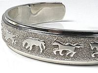 Overall view of sterling cuff with horse motifs