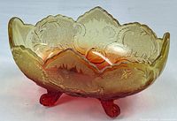 Overall view of Amberina Fenton footed banana bowl showing gradient color and floral pattern