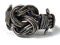 Front view highlighting knot design and silver finish