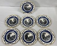 Group view of seven Wedgwood plates