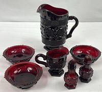 Entire seven-piece ruby red glass set
