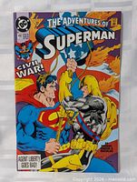 Front cover displaying title, artwork of Superman vs Agent Liberty, price box, issue number