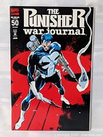 Front cover showing title, character artwork, issue number 50, price information