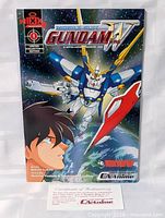 Front cover of Mobile Suit Gundam Wing #1 comic with COA card shown