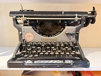 Front view of Underwood typewriter showing full keyboard and carriage