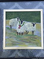 Full view of framed sheep painting