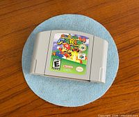 Front view of Super Mario 64 cartridge showing label and cartridge shell