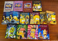 All 12 season box sets laid out showing front artwork and variety of packaging styles