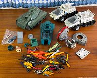 Overall view of vehicles, parts, and accessories on tabletop