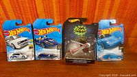 Group shot of all five mint on card Hot Wheels vehicles