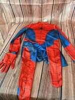 Full Spider-Man jumpsuit laid flat showing front design