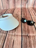 Visor and sunglasses side by side