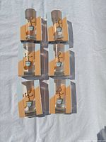 Front view of six boxed Baby Groot glasses