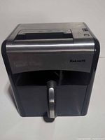 Front angled view showing overall shredder and handle