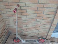 Full view of Razor scooter standing upright