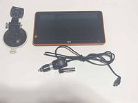 Front view of GPS unit on white background showing screen and bezel.