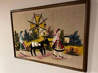 Front view of framed 3D fabric art showing full scene and frame