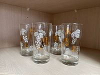 set of grape motif glass tumblers