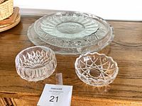 Front view of bowls and one platter for scale