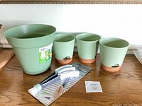 All four planters and cleaning tool overview