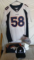 Full bundle: jersey on hanger, two hats, cinch sack