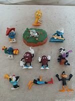 Group shot of all 11 PVC figures laid out