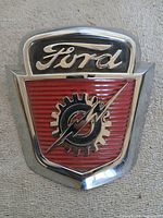 Front view of emblem showing design and colours