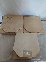 Three original cardboard mailers marked Reco and unbranded