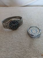 Both watches side by side showing overall condition