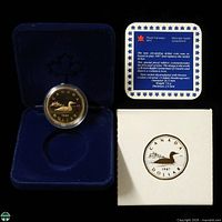 Proof loon coin in open case with slipcover and information card
