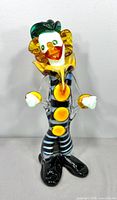 Full view of glass clown figurine