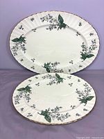 Both Valencia pattern platters front view