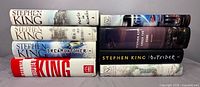 Group shot showing nine Stephen King hardcovers