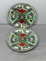 Two 6-inch Chinese Famille Rose Medallion plates front view
