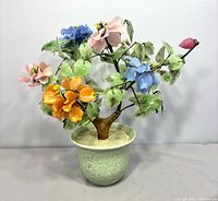 Full view of glass bonsai sculpture in porcelain pot