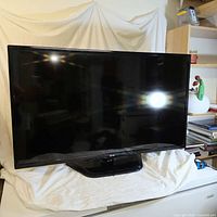 Front view of LG television on stand