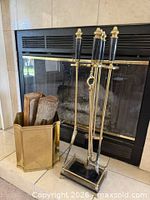 overall view of tool set on stand beside log holder