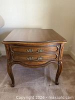 Full view of Thomasville end table showing drawers, legs, top