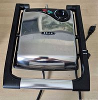 Top view of Bella stainless steel panini press with power cord
