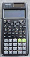Front view of calculator showing keys, display and solar panel