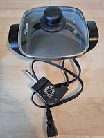 Pan with lid and power cord overview