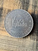 Reverse side showing fort design and legends