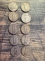 11 nickels reverse sides visible showing Monticello and Buffalo designs