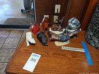 Group shot showing all nine animal figurines on table