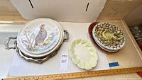 Top view of primary plates, metal tray, deviled egg platters