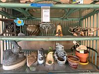 Shelf view showing most garden décor pieces together