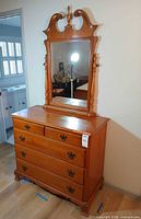 front view of dresser with attached mirror